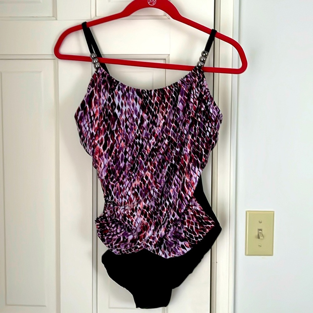 Bathing suit , size 12 . New, tried on never worn.